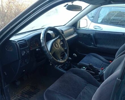 Зеленый Опель Фронтера, объемом двигателя 2.2 л и пробегом 183 тыс. км за 2200 $, фото 4 на Automoto.ua