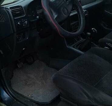 Зеленый Опель Фронтера, объемом двигателя 2.17 л и пробегом 290 тыс. км за 6500 $, фото 6 на Automoto.ua