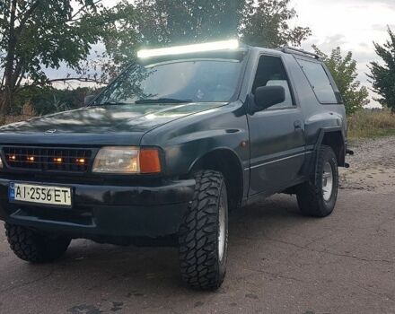 Зеленый Опель Фронтера, объемом двигателя 2 л и пробегом 300 тыс. км за 4000 $, фото 1 на Automoto.ua