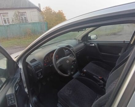 Серый Опель ГТ, объемом двигателя 1.6 л и пробегом 145 тыс. км за 2600 $, фото 7 на Automoto.ua