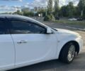 Білий Опель Інсігнія, об'ємом двигуна 2 л та пробігом 360 тис. км за 6624 $, фото 4 на Automoto.ua