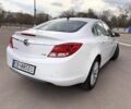 Білий Опель Інсігнія, об'ємом двигуна 2 л та пробігом 150 тис. км за 9500 $, фото 8 на Automoto.ua
