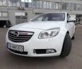 Білий Опель Інсігнія, об'ємом двигуна 2 л та пробігом 150 тис. км за 9500 $, фото 2 на Automoto.ua