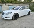 Білий Опель Інсігнія, об'ємом двигуна 2 л та пробігом 145 тис. км за 7003 $, фото 10 на Automoto.ua