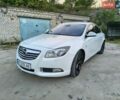 Белый Опель Инсигния, объемом двигателя 2 л и пробегом 145 тыс. км за 7000 $, фото 1 на Automoto.ua