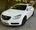Белый Опель Инсигния, объемом двигателя 2 л и пробегом 277 тыс. км за 8500 $, фото 1 на Automoto.ua