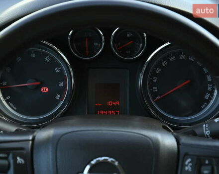 Білий Опель Інсігнія, об'ємом двигуна 1.8 л та пробігом 134 тис. км за 7800 $, фото 24 на Automoto.ua