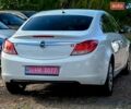 Білий Опель Інсігнія, об'ємом двигуна 1.8 л та пробігом 134 тис. км за 7700 $, фото 10 на Automoto.ua