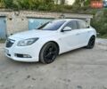 Белый Опель Инсигния, объемом двигателя 2 л и пробегом 145 тыс. км за 7000 $, фото 1 на Automoto.ua