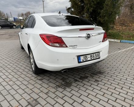 Белый Опель Инсигния, объемом двигателя 2 л и пробегом 363 тыс. км за 3300 $, фото 3 на Automoto.ua