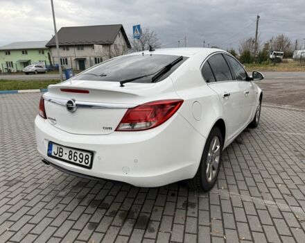 Белый Опель Инсигния, объемом двигателя 2 л и пробегом 363 тыс. км за 3300 $, фото 2 на Automoto.ua