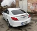Білий Опель Інсігнія, об'ємом двигуна 2 л та пробігом 185 тис. км за 3750 $, фото 2 на Automoto.ua
