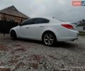 Білий Опель Інсігнія, об'ємом двигуна 2 л та пробігом 276 тис. км за 6900 $, фото 2 на Automoto.ua