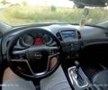 Білий Опель Інсігнія, об'ємом двигуна 2 л та пробігом 275 тис. км за 7095 $, фото 5 на Automoto.ua