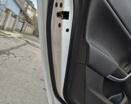 Білий Опель Інсігнія, об'ємом двигуна 2 л та пробігом 145 тис. км за 8950 $, фото 11 на Automoto.ua