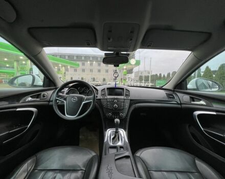 Белый Опель Инсигния, объемом двигателя 2 л и пробегом 320 тыс. км за 5950 $, фото 14 на Automoto.ua