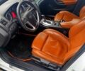 Білий Опель Інсігнія, об'ємом двигуна 2 л та пробігом 279 тис. км за 8200 $, фото 4 на Automoto.ua
