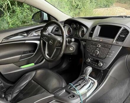 Білий Опель Інсігнія, об'ємом двигуна 2 л та пробігом 165 тис. км за 9500 $, фото 6 на Automoto.ua