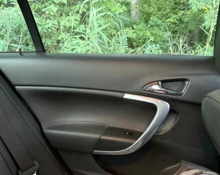 Білий Опель Інсігнія, об'ємом двигуна 2 л та пробігом 165 тис. км за 9500 $, фото 4 на Automoto.ua