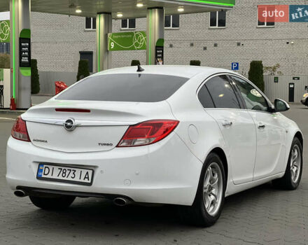 Белый Опель Инсигния, объемом двигателя 2 л и пробегом 325 тыс. км за 5350 $, фото 5 на Automoto.ua