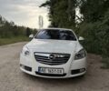 Белый Опель Инсигния, объемом двигателя 2 л и пробегом 165 тыс. км за 9200 $, фото 1 на Automoto.ua