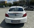 Білий Опель Інсігнія, об'ємом двигуна 2 л та пробігом 195 тис. км за 5398 $, фото 2 на Automoto.ua