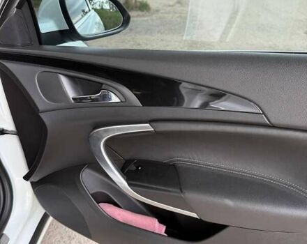 Білий Опель Інсігнія, об'ємом двигуна 2 л та пробігом 165 тис. км за 9500 $, фото 5 на Automoto.ua