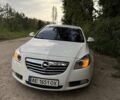 Белый Опель Инсигния, объемом двигателя 2 л и пробегом 165 тыс. км за 9500 $, фото 1 на Automoto.ua