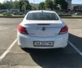 Білий Опель Інсігнія, об'ємом двигуна 2 л та пробігом 82 тис. км за 12500 $, фото 5 на Automoto.ua