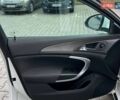Білий Опель Інсігнія, об'ємом двигуна 2 л та пробігом 178 тис. км за 6800 $, фото 13 на Automoto.ua