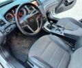 Білий Опель Інсігнія, об'ємом двигуна 2 л та пробігом 225 тис. км за 7400 $, фото 1 на Automoto.ua