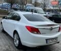 Білий Опель Інсігнія, об'ємом двигуна 2 л та пробігом 178 тис. км за 6800 $, фото 9 на Automoto.ua