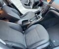 Білий Опель Інсігнія, об'ємом двигуна 2 л та пробігом 225 тис. км за 7400 $, фото 3 на Automoto.ua