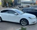 Белый Опель Инсигния, объемом двигателя 2 л и пробегом 220 тыс. км за 7500 $, фото 1 на Automoto.ua