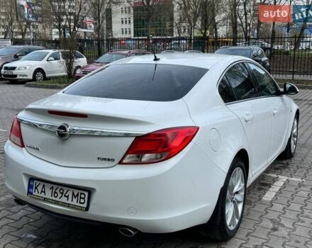Білий Опель Інсігнія, об'ємом двигуна 2 л та пробігом 178 тис. км за 6800 $, фото 10 на Automoto.ua