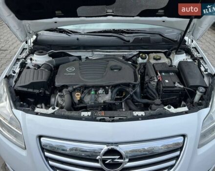 Білий Опель Інсігнія, об'ємом двигуна 2 л та пробігом 178 тис. км за 6800 $, фото 24 на Automoto.ua