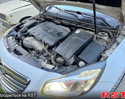 Белый Опель Инсигния, объемом двигателя 2 л и пробегом 225 тыс. км за 8900 $, фото 5 на Automoto.ua