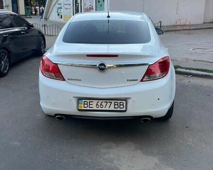 Белый Опель Инсигния, объемом двигателя 2 л и пробегом 220 тыс. км за 7500 $, фото 2 на Automoto.ua