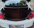 Белый Опель Инсигния, объемом двигателя 2 л и пробегом 290 тыс. км за 8700 $, фото 2 на Automoto.ua