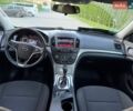 Білий Опель Інсігнія, об'ємом двигуна 2 л та пробігом 183 тис. км за 9899 $, фото 27 на Automoto.ua