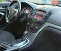 Білий Опель Інсігнія, об'ємом двигуна 2 л та пробігом 183 тис. км за 9899 $, фото 26 на Automoto.ua