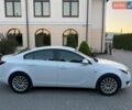 Білий Опель Інсігнія, об'ємом двигуна 2 л та пробігом 183 тис. км за 9899 $, фото 10 на Automoto.ua