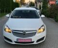 Білий Опель Інсігнія, об'ємом двигуна 2 л та пробігом 183 тис. км за 9899 $, фото 4 на Automoto.ua