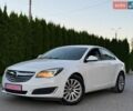 Білий Опель Інсігнія, об'ємом двигуна 2 л та пробігом 183 тис. км за 9899 $, фото 2 на Automoto.ua