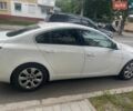 Білий Опель Інсігнія, об'ємом двигуна 1.6 л та пробігом 220 тис. км за 9900 $, фото 1 на Automoto.ua