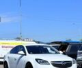 Білий Опель Інсігнія, об'ємом двигуна 1.6 л та пробігом 215 тис. км за 10999 $, фото 1 на Automoto.ua