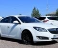 Білий Опель Інсігнія, об'ємом двигуна 1.6 л та пробігом 215 тис. км за 10999 $, фото 2 на Automoto.ua