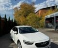 Білий Опель Інсігнія, об'ємом двигуна 1.96 л та пробігом 230 тис. км за 13700 $, фото 1 на Automoto.ua