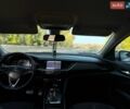 Білий Опель Інсігнія, об'ємом двигуна 1.96 л та пробігом 230 тис. км за 13700 $, фото 12 на Automoto.ua