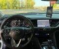 Білий Опель Інсігнія, об'ємом двигуна 1.96 л та пробігом 230 тис. км за 13700 $, фото 28 на Automoto.ua